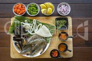 Raw seafood on plate, healthy food, prawn, clam squid