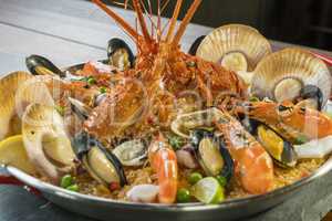 Paella with fresh lobster, scallops, mussels and prawn