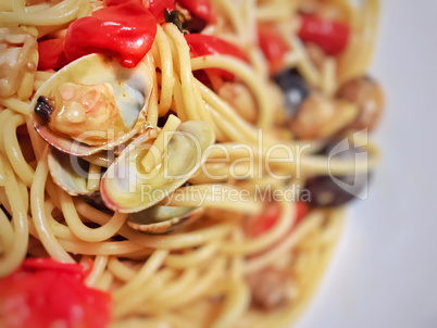 Spaghetti with tiny baby clams in the shell.