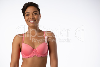Woman for breast cancer awareness with ribbon