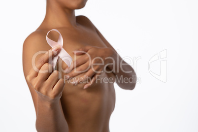 Woman for breast cancer awareness with ribbon Woman for breast cancer awareness with ribbon