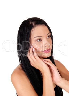 Portrait of beautiful young woman looking away