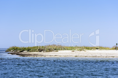 view of the island Dzharylgach from the shore on a summer day, U