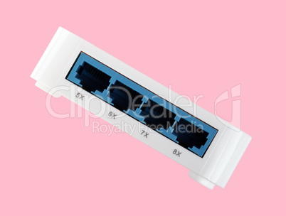 White 8 Port Plastic Ethernet Switch isolated on pink background