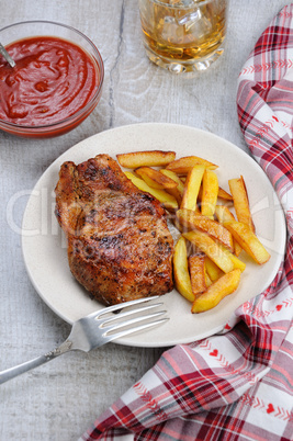 pork steak on dice with potatoes