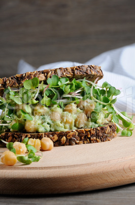 Chickpea Avocado Sandwich with radish sprouts