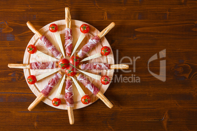 Cutting board with ham cheese and cherry tomatoes