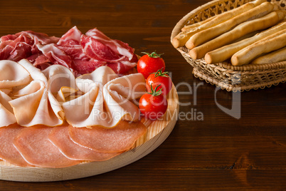 Italian cutting board and breadsticks
