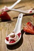 Close up of a mascarpone cheese and strawberries