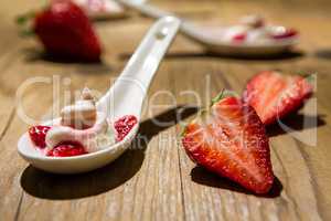 Close up of a mascarpone cream and strawberries
