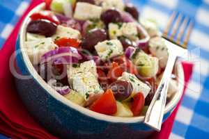 Close up of greek salad with feta cheese tomatoes cucumber olive