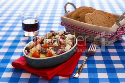 Greek salad with feta cheese olives tomatoes cucumber and onions