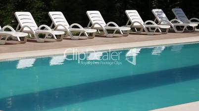 Swimming Pool with Lounge Chairs