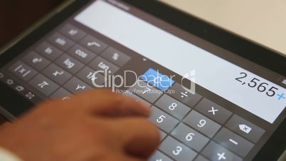 Using Digital Calculator on Tablet Screen
