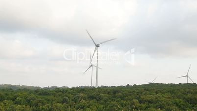 Huge Windmills, Wind Turbines Generating Electricity on Windy Day