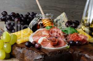 antipasti platter on wooden surface