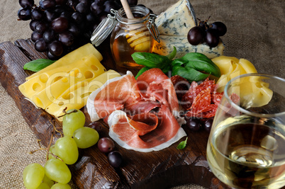 antipasti platter on wooden surface