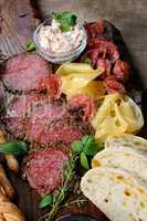 antipasti platter on wooden surface