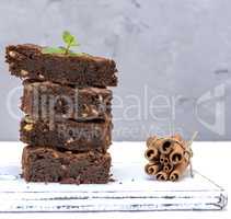 square pieces of chocolate brownies with walnuts