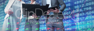 Composite image of low angle view of business people discussing files