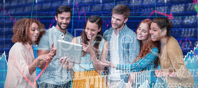 Composite image of happy businesswoman showing tablet to colleagues