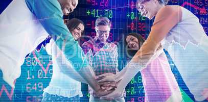 Composite image of low angle view of business people huddling hands