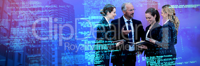 Composite image of businessman explaining to female colleagues
