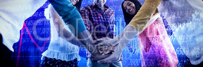 Composite image of low angle view of business people huddling hands