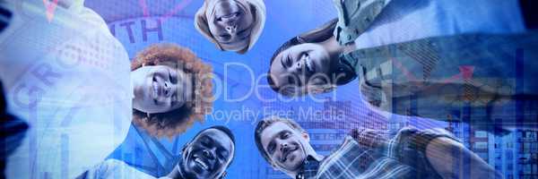Composite image of low angle portrait of happy business people