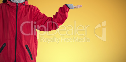 Composite image of blissful woman standing with arms outstretched