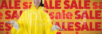 Composite image of woman in yellow raincoat gesturing to feel the rain