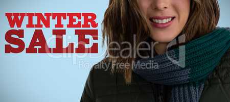 Composite image of close up portrait of smiling woman in scarf