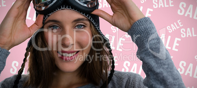 Composite image of portrait of woman with ski goggles