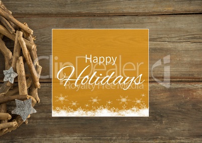 Happy holidays text with wood decoration