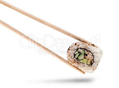 Sushi roll of california with chopsticks