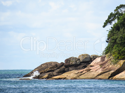 Landscape of island and forest cliffs in close up.