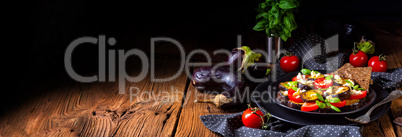 Eggplant grilled with aromatic feta cheese and tomatoes