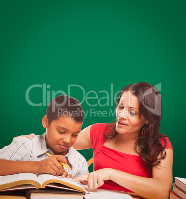 Blank Chalk Board Behind Hispanic Young Boy and Female Adult Tutor