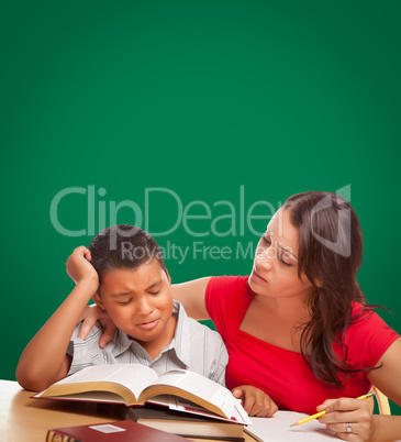 Blank Chalk Board Behind Hispanic Young Boy and Female Adult Tutor