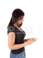 Woman standing and dialing other phone