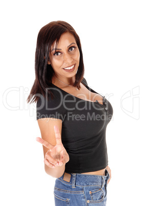 Beautiful young woman making victory sign