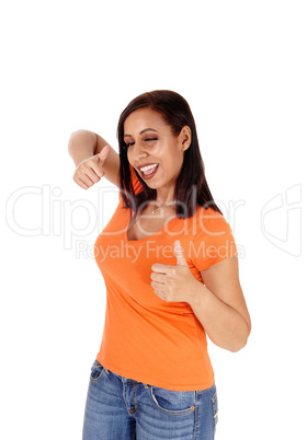Woman showing victory sign with one eye closed