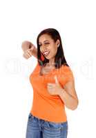 Woman showing victory sign with one eye closed