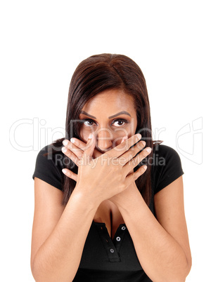 Woman with booths hands over her mouths
