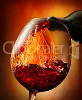 Red wine on an orange background