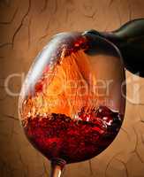 Red wine on clay background
