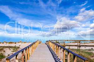 Wooden walkway to the sea at costa nova in Portugal