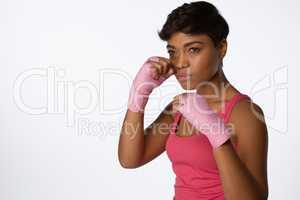 Serious looking woman fighting against breast cancer