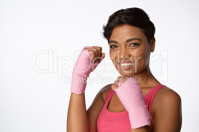 Smiling woman for breast cancer awareness