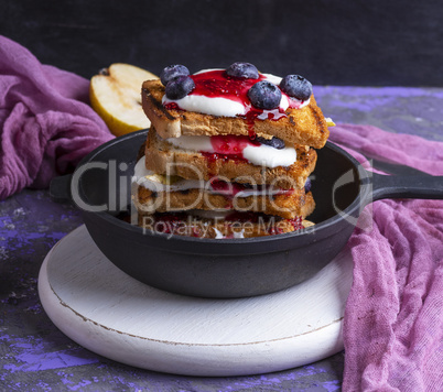 French toast with jam, sour cream and fruit